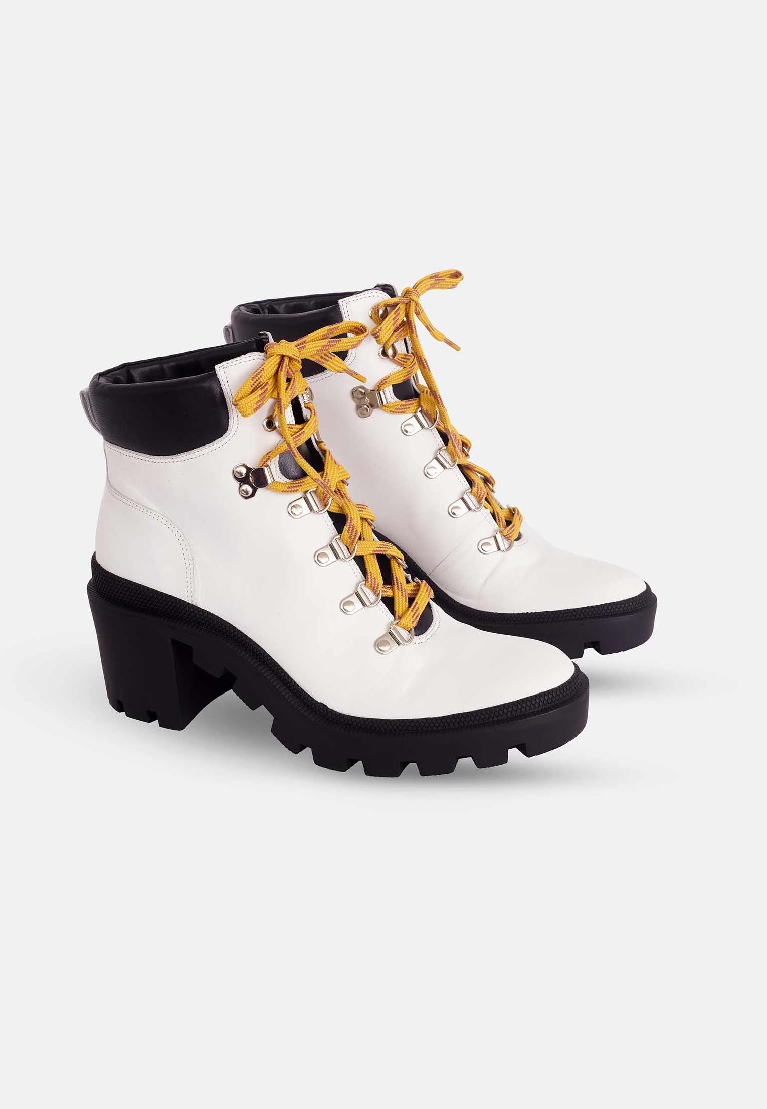 Ladies White Combat Style Boot with 9cm Block Heel.